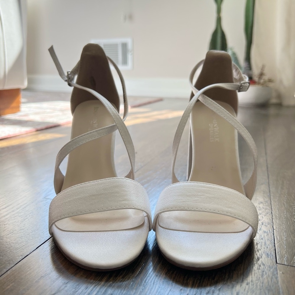 Brand new, white heels